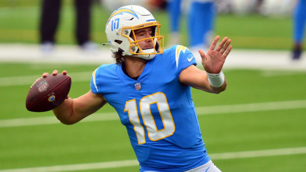 Los Angeles Chargers quarterback Justin Herbert (10) throws against the Jacksonville Jaguars during the first half at SoFi Stadium.